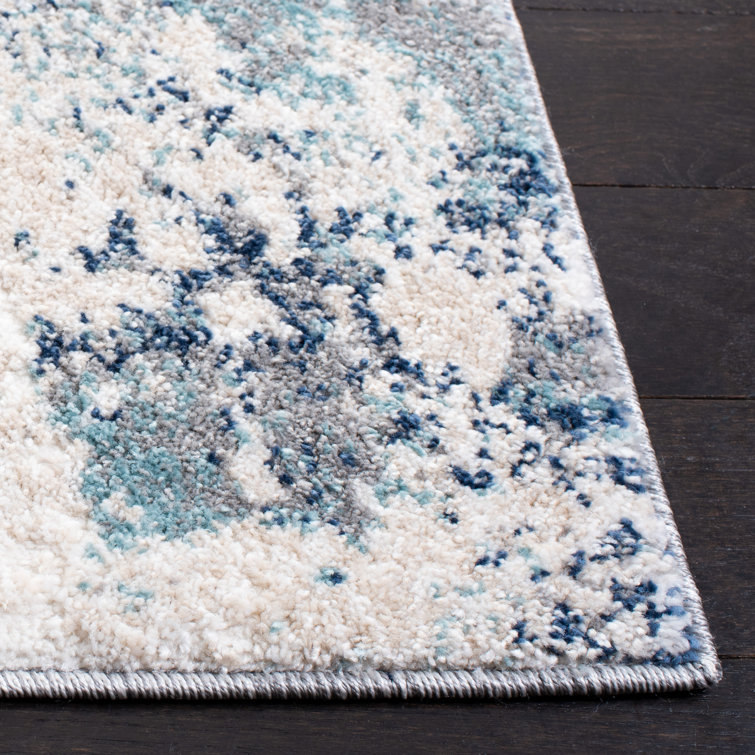 Ivory and Blue Abstract Synthetic Area Rug, 3' x 5'