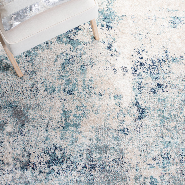 Ivory and Blue Abstract Synthetic Area Rug, 3' x 5'