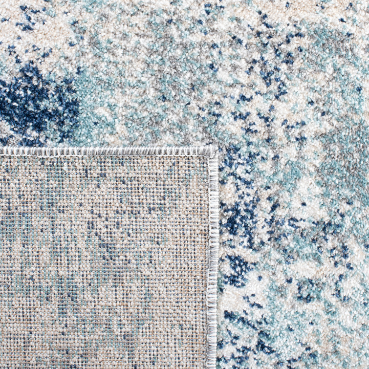 Ivory and Blue Abstract Synthetic Area Rug, 3' x 5'