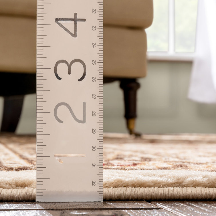 Ivory and Beige Oriental Synthetic Runner Rug