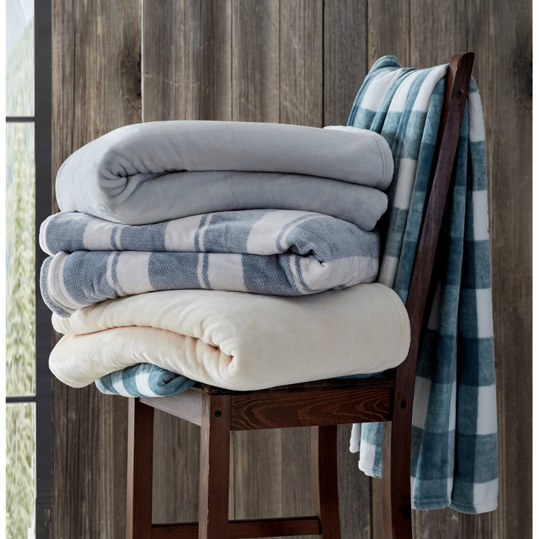 Cozy Twin-Sized Fleece Packable Blanket in Ivory