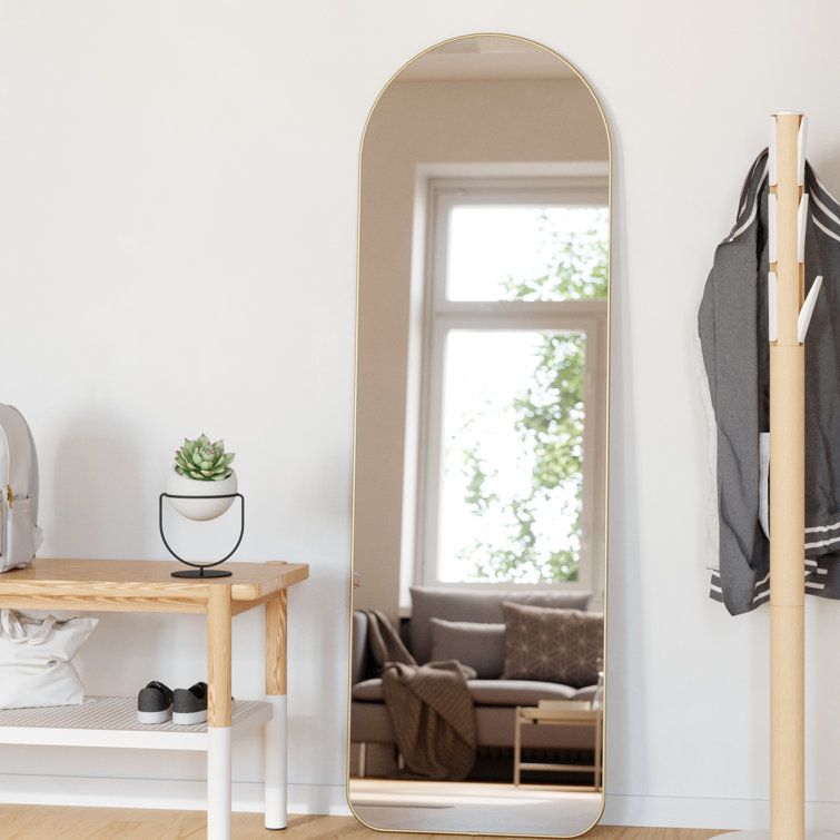Elegant Arch Brass Leaning Floor Mirror with Sleek Metallic Rim