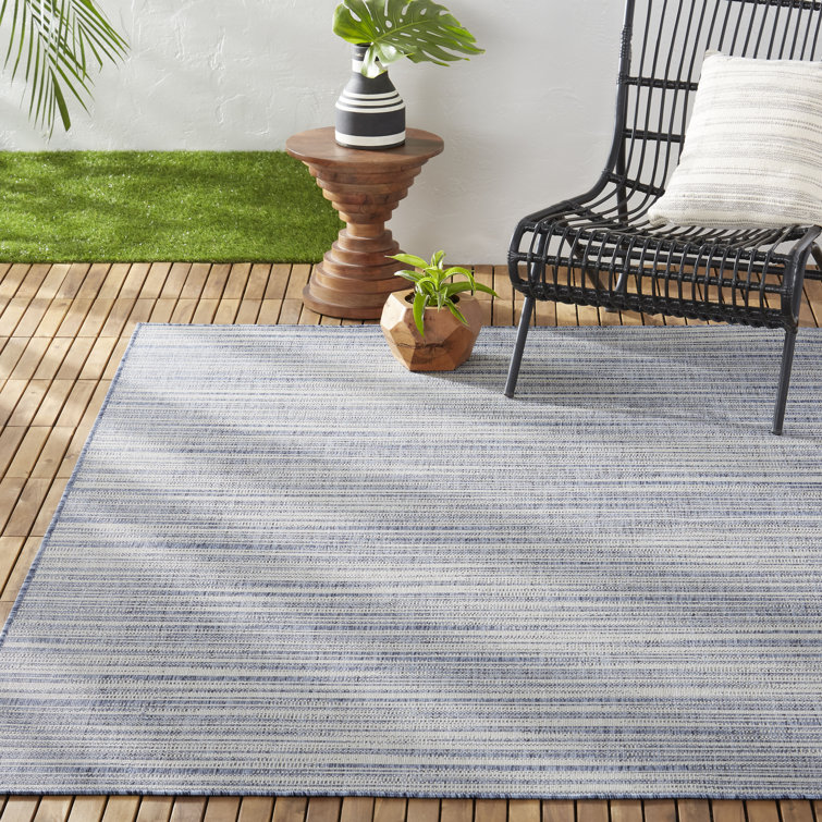 Abstract Blue and Beige Indoor/Outdoor Synthetic Area Rug, 5'2"x7'2"