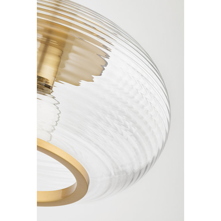 Elegant Aged Brass Globe Flush Mount with Clear Glass Shade
