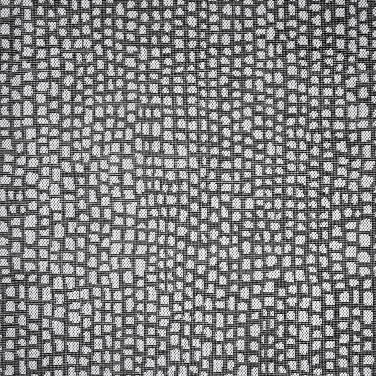 Reversible Black Synthetic 5' x 7' Easy-Care Area Rug