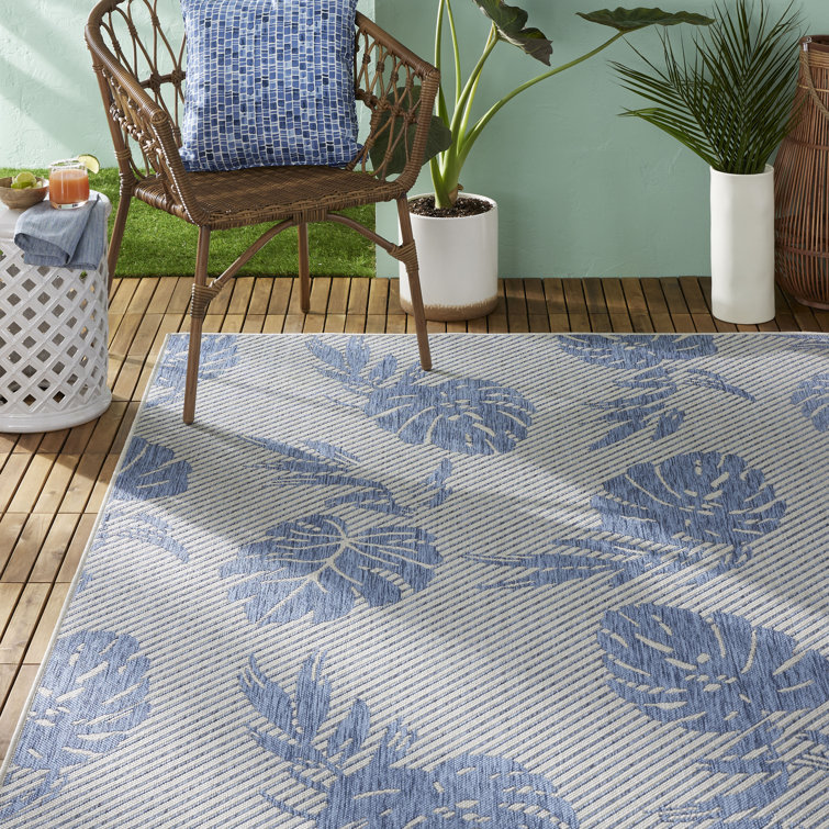 Palm Leaf Blue and Silver Synthetic Indoor/Outdoor Area Rug