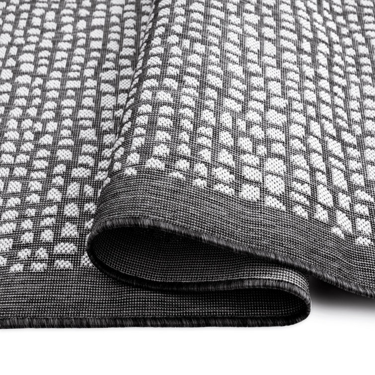 Reversible Black Synthetic 5' x 7' Easy-Care Area Rug