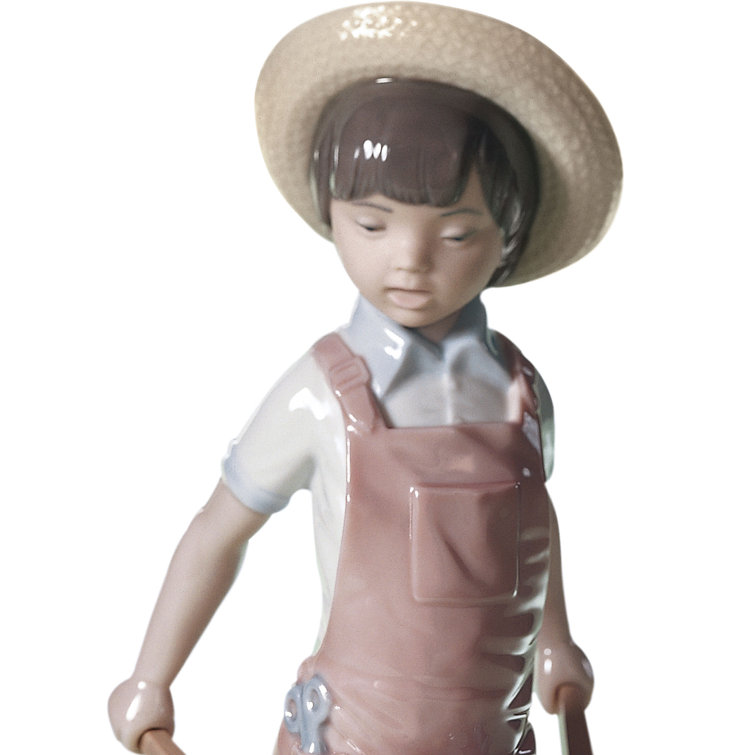 Springtime Gardener with Wheelbarrow Porcelain Figurine