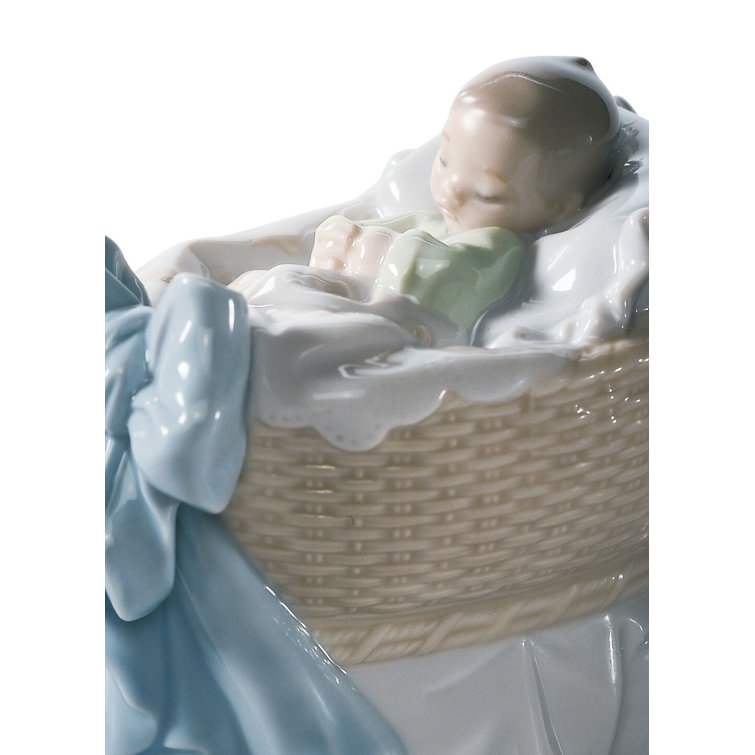 Glossy Porcelain Sleeping Child Figurine with Blue Ribbon