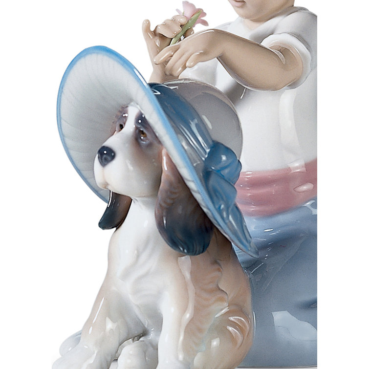Glossy Porcelain Girl and Dog Figurine with Blue and Red Accents