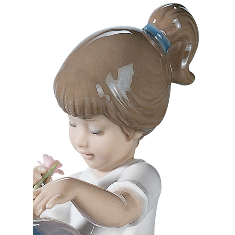 Glossy Porcelain Girl and Dog Figurine with Blue and Red Accents