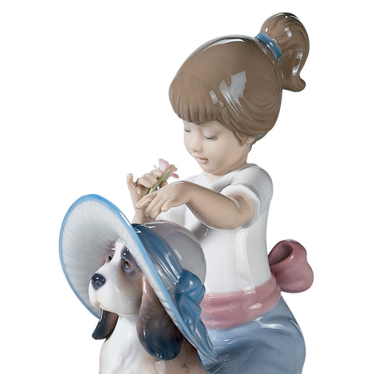 Glossy Porcelain Girl and Dog Figurine with Blue and Red Accents