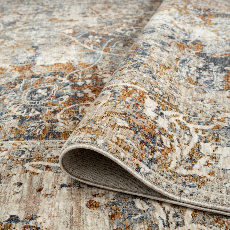 Hand-knotted Blue and Rust Floral Viscose Area Rug