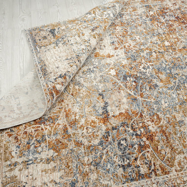 Hand-knotted Blue and Rust Floral Viscose Area Rug