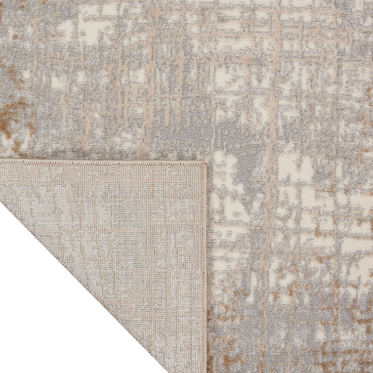 Ivory and Taupe Abstract Rectangular Synthetic Rug