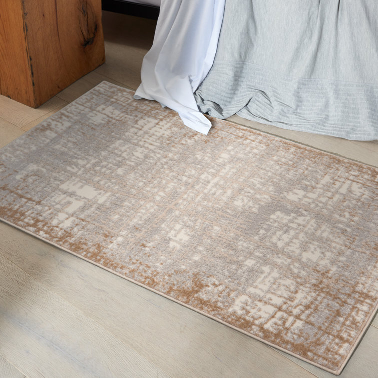 Ivory and Taupe Abstract Rectangular Synthetic Rug