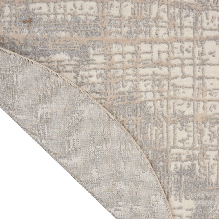 Ivory and Taupe Round Abstract Synthetic Rug, 4 ft
