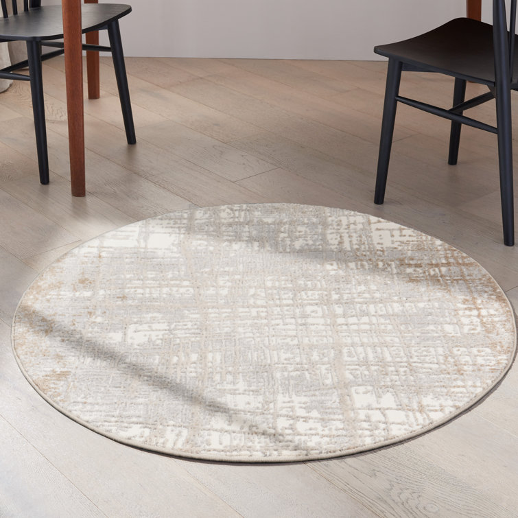 Ivory and Taupe Round Abstract Synthetic Rug, 4 ft