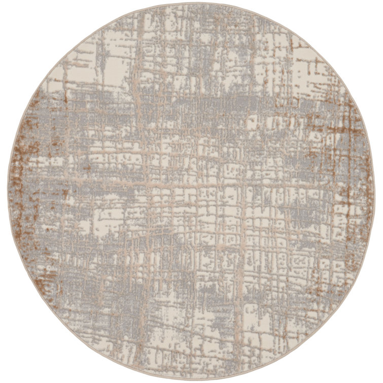 Ivory and Taupe Round Abstract Synthetic Rug, 4 ft