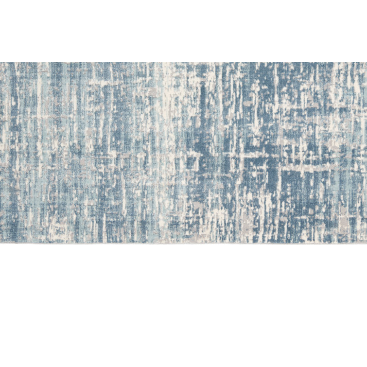 Ivory and Blue Abstract Rectangular Synthetic Rug