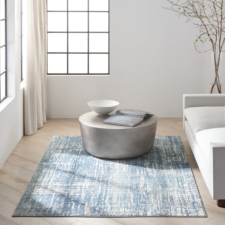 Ivory Abstract Elegance 8' x 10' Synthetic Easy-Care Area Rug
