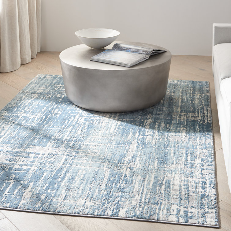 Ivory Abstract Elegance 8' x 10' Synthetic Easy-Care Area Rug
