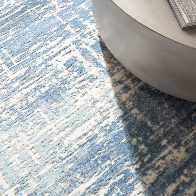 Ivory and Blue Abstract Rectangular Synthetic Rug