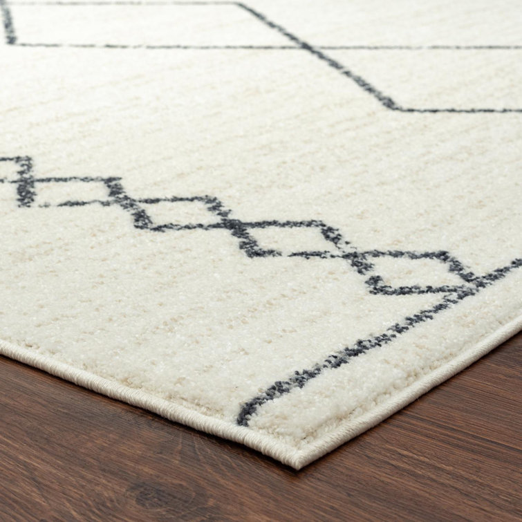 Cream Geometric Synthetic 8' x 10' Area Rug