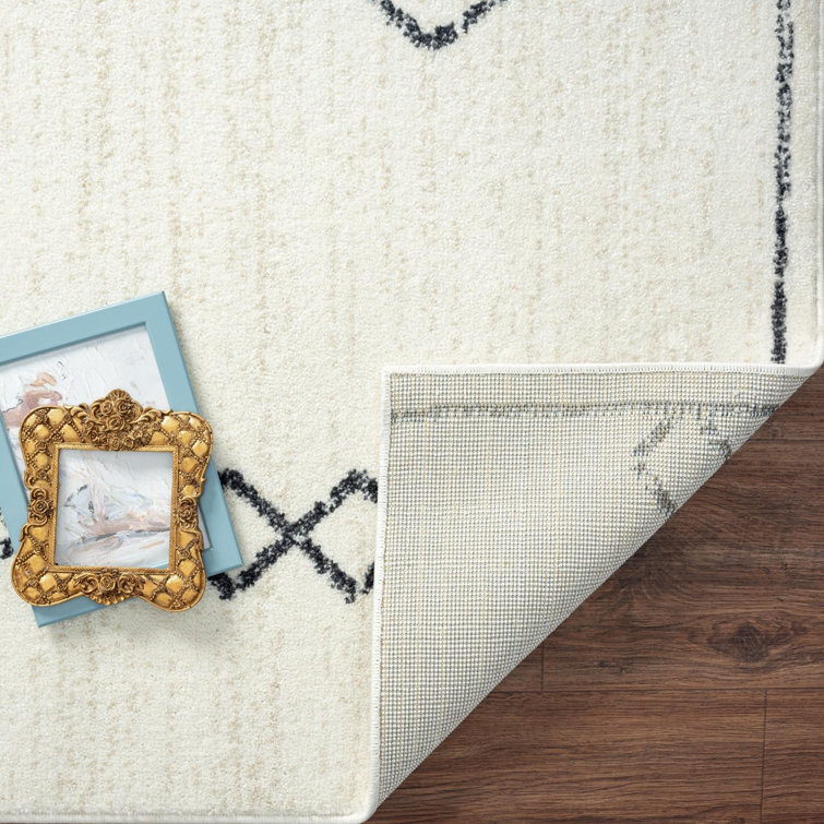 Cream Geometric Synthetic 8' x 10' Area Rug