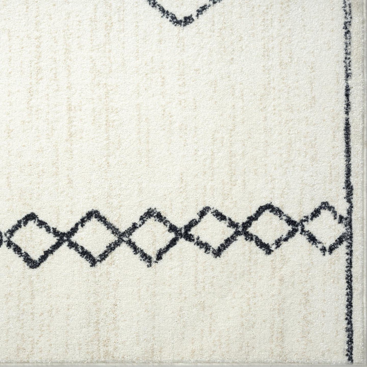 Cream Geometric Synthetic 8' x 10' Area Rug