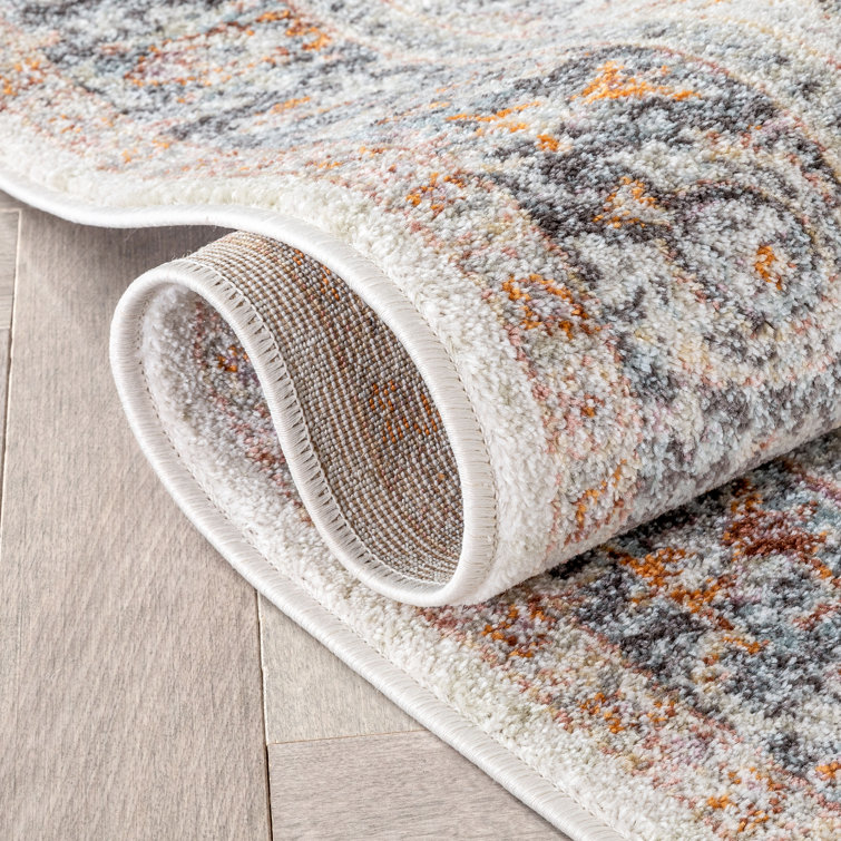 Ivory Floral Synthetic Reversible 5' x 7' Area Rug