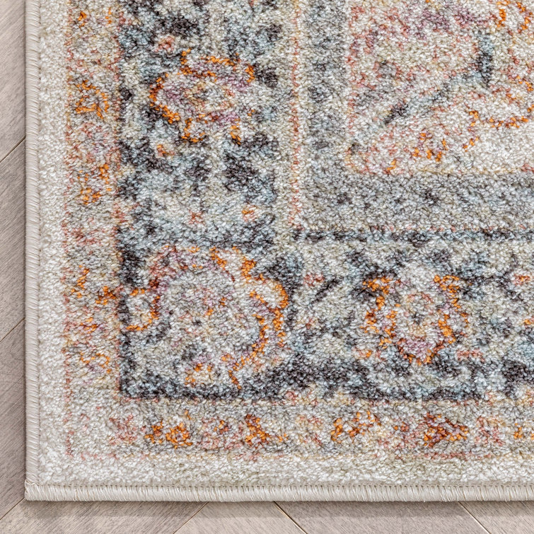 Ivory Floral Synthetic Reversible 5' x 7' Area Rug