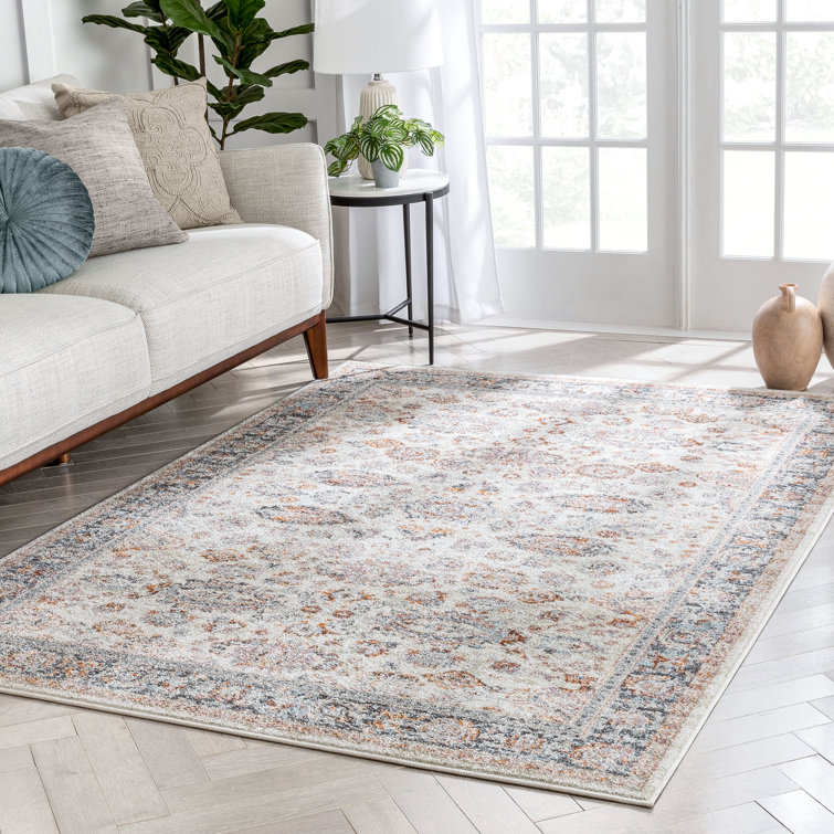 Ivory Floral Synthetic Reversible 5' x 7' Area Rug