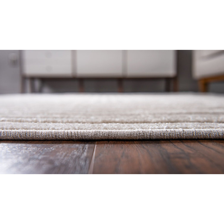 Beige Geometric 5' x 8' Synthetic Outdoor Area Rug