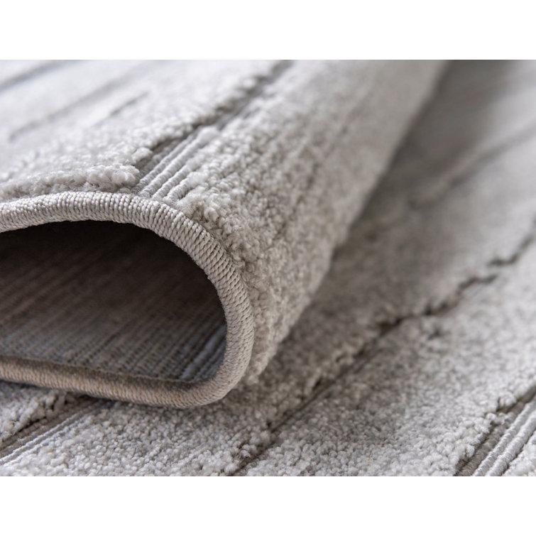 Beige Geometric 5' x 8' Synthetic Outdoor Area Rug