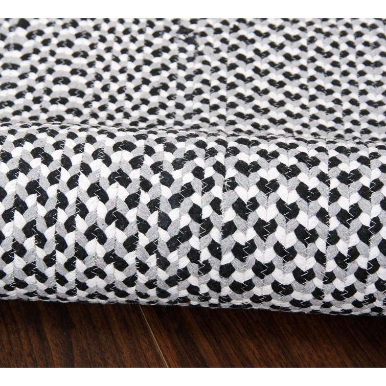 Handmade Oval Black and White Cotton Braided Area Rug