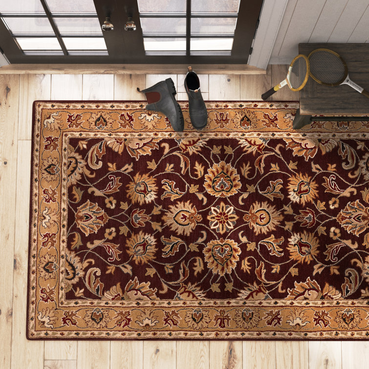 Handmade Round Burgundy and Gold Wool Area Rug