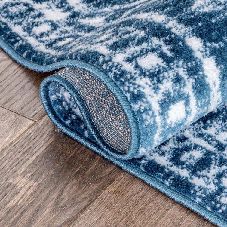 Light Blue Floral Synthetic Reversible 5' x 7' Rug
