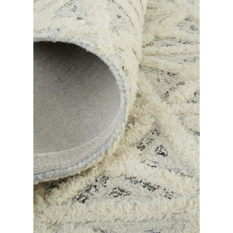 Ivory and Beige Geometric Wool 5' x 8' Area Rug