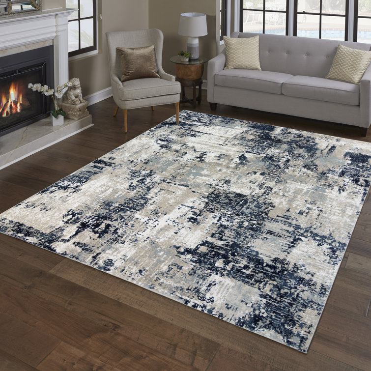 Ivory and Navy Abstract 5' x 7' Synthetic Area Rug