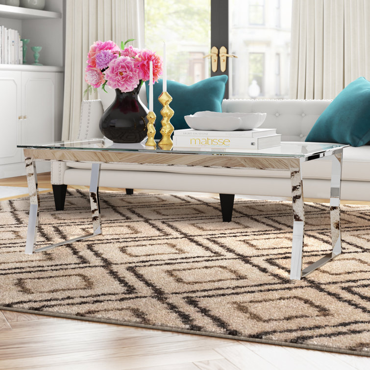 Xander Clear Tempered Glass Top Chrome Sled Coffee Table