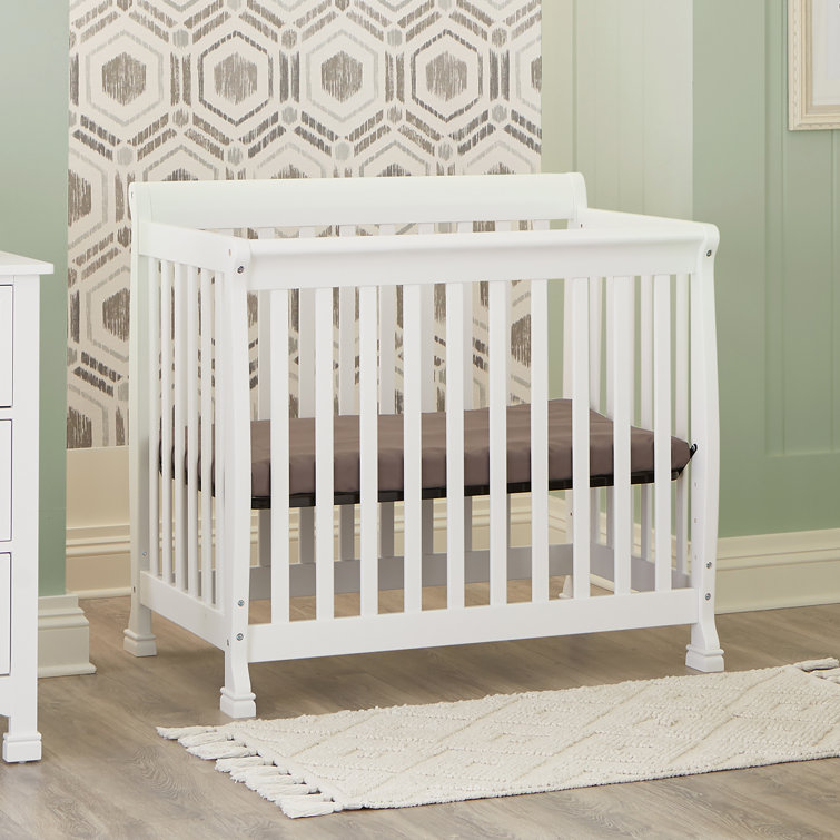 White Wooden 4-in-1 Convertible Mini Crib and Dresser Set