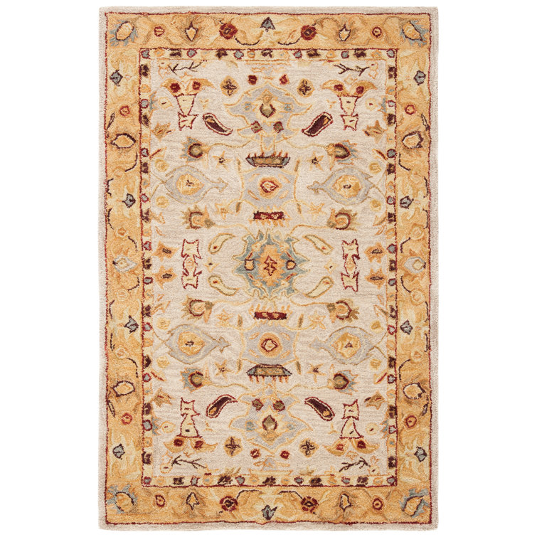 Ivory and Gold Hand-Tufted Wool 4' x 6' Area Rug