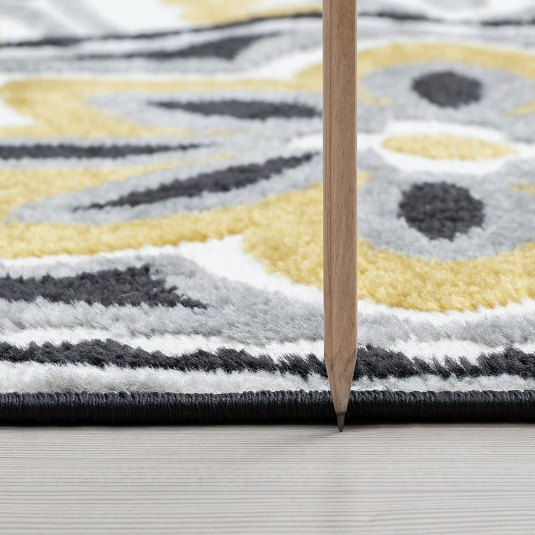 Wyatt Yellow Floral Reversible 5' x 8' Synthetic Area Rug