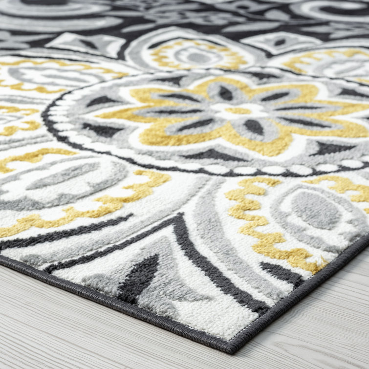 Wyatt Yellow Floral Reversible 5' x 8' Synthetic Area Rug