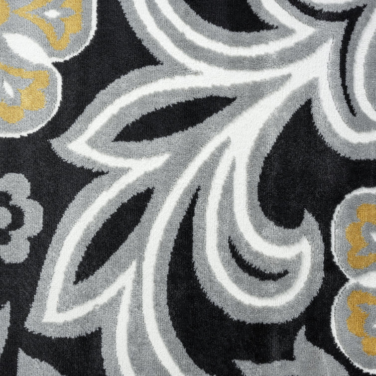 Wyatt Yellow Floral Reversible 5' x 8' Synthetic Area Rug