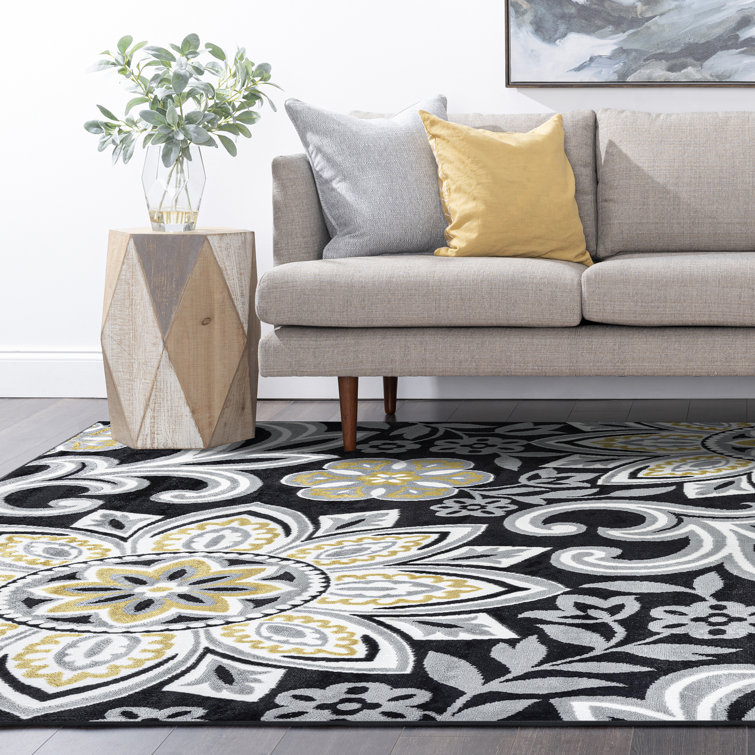 Wyatt Yellow Floral Reversible 5' x 8' Synthetic Area Rug