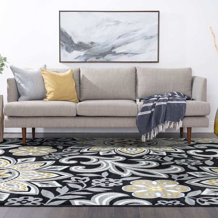 Wyatt Yellow Floral Reversible 5' x 8' Synthetic Area Rug