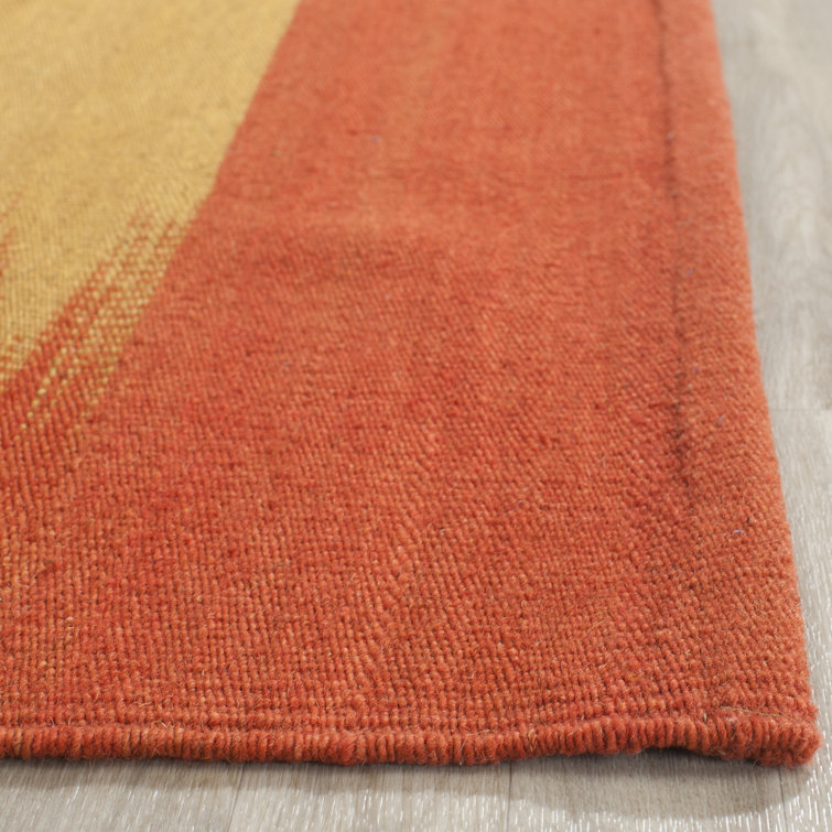 Hand-Woven Rust Wool 5' x 8' Reversible Area Rug