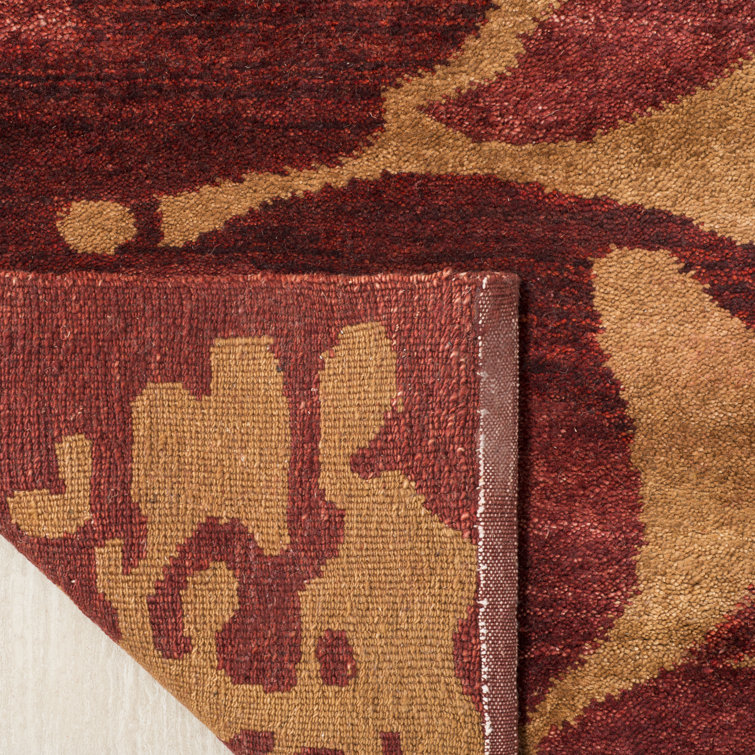 Hand-Knotted Geometric Red Wool 6' x 9' Area Rug